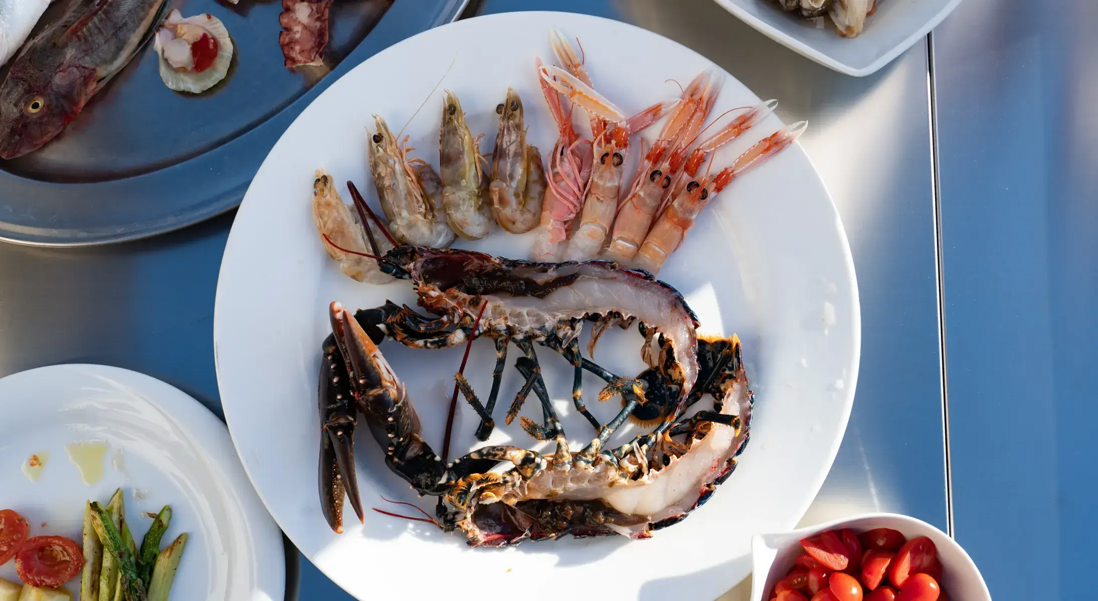 Pesce cucinato su barbecue Fògher